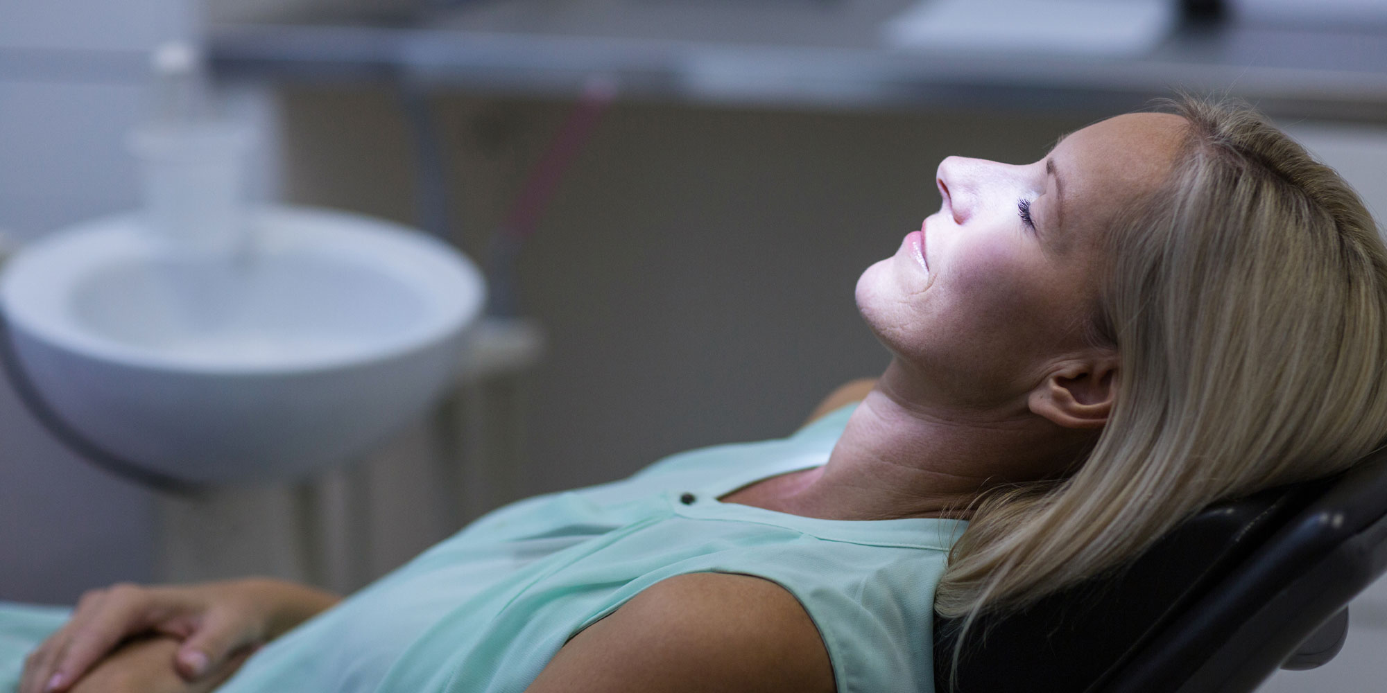 A patient under IV sedation during a long surgical case
