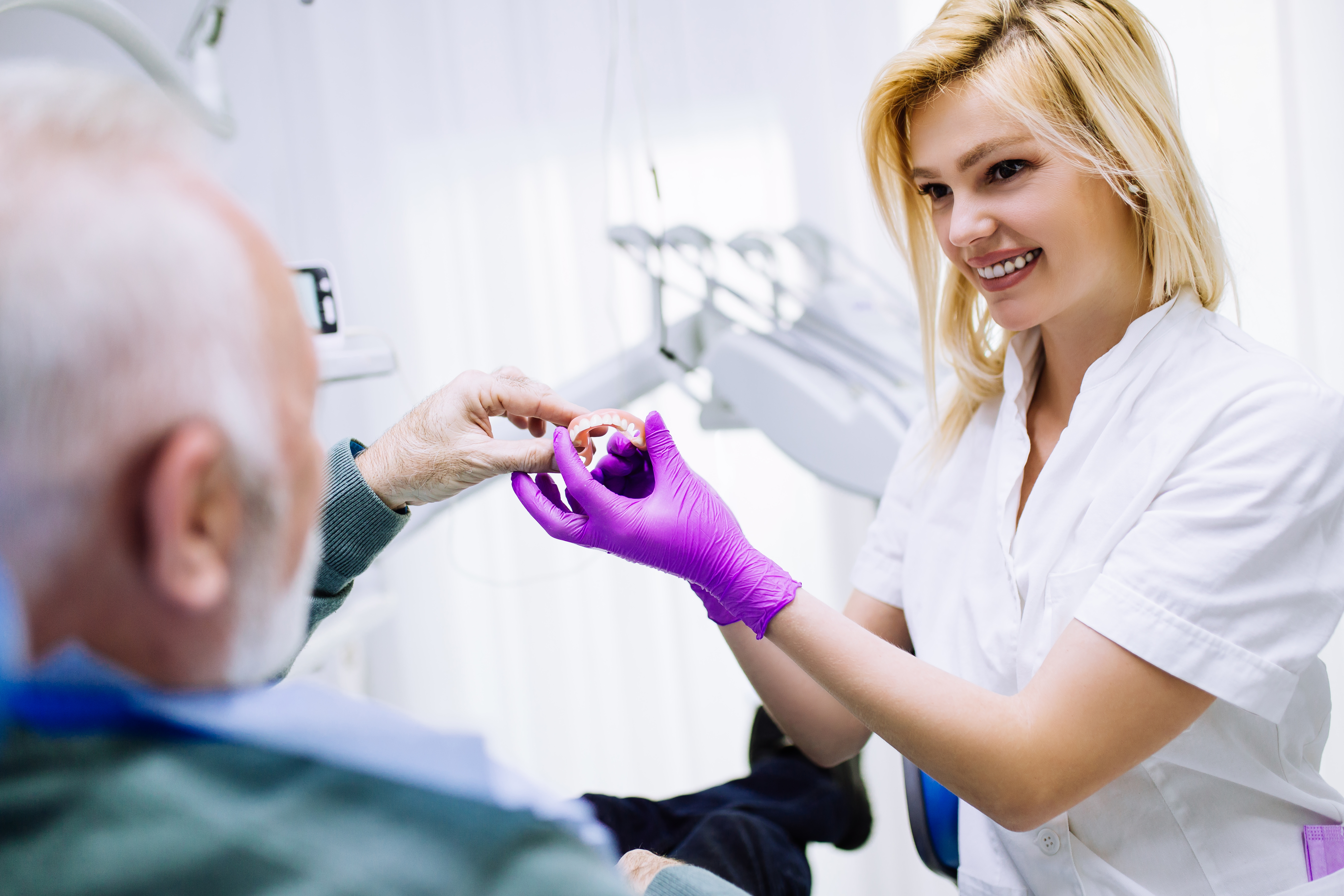 A senior man in the chair during dental treatment